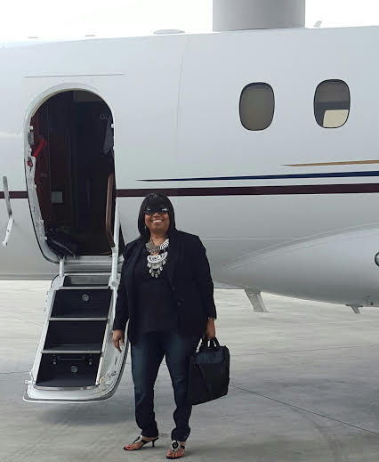 Sandra getting on private plane